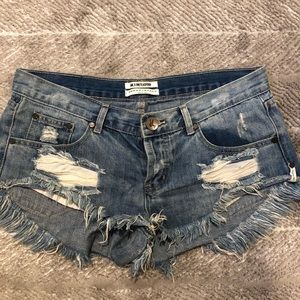 Ripped jean shorts